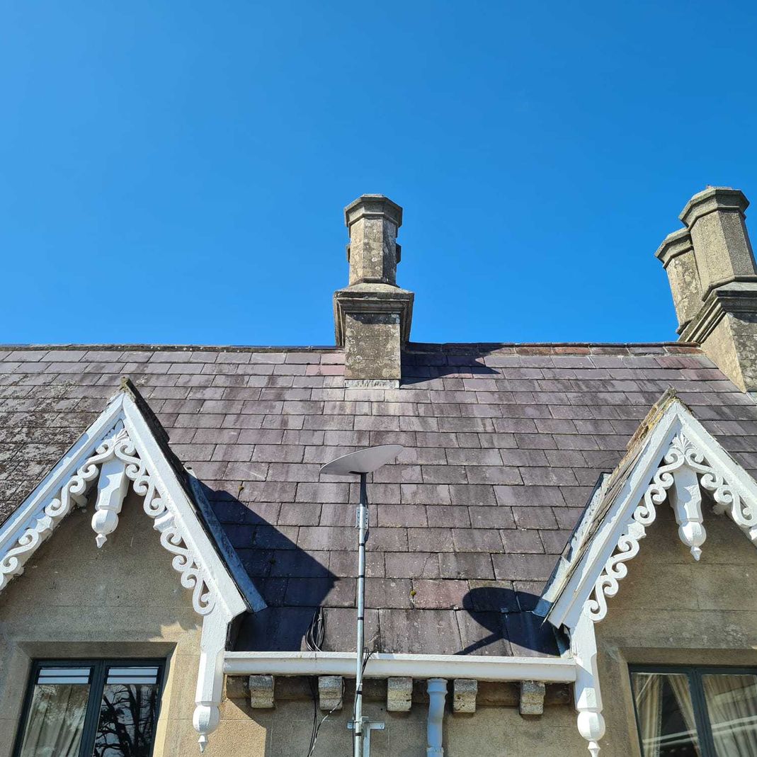 starlink antenna installed on the side of a house in Meath