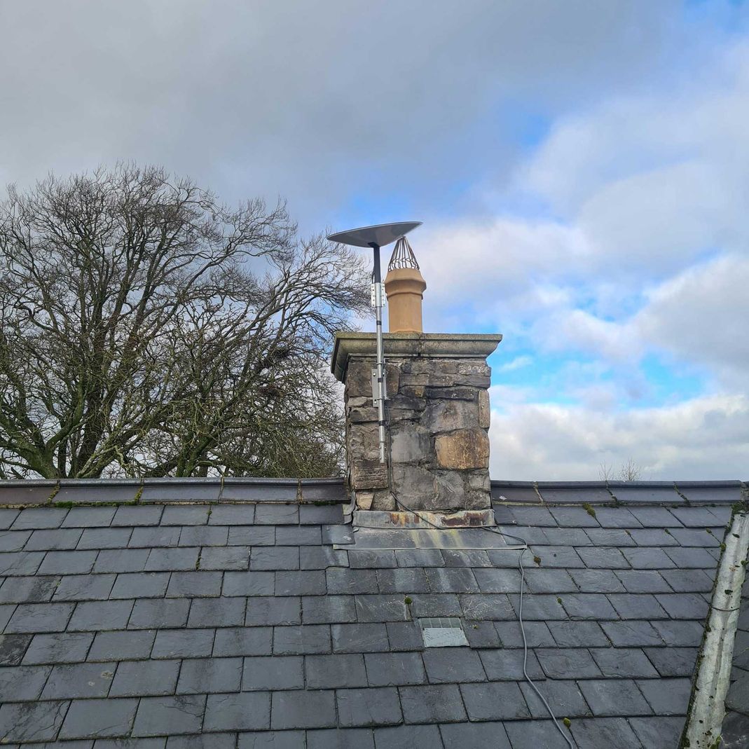 starlink antenna professional installed on a chimney